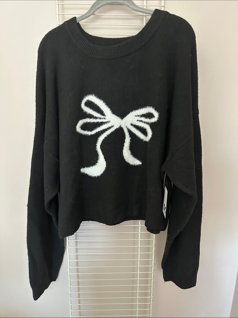 SO Black Crewneck Sweater with White Bow Graphic